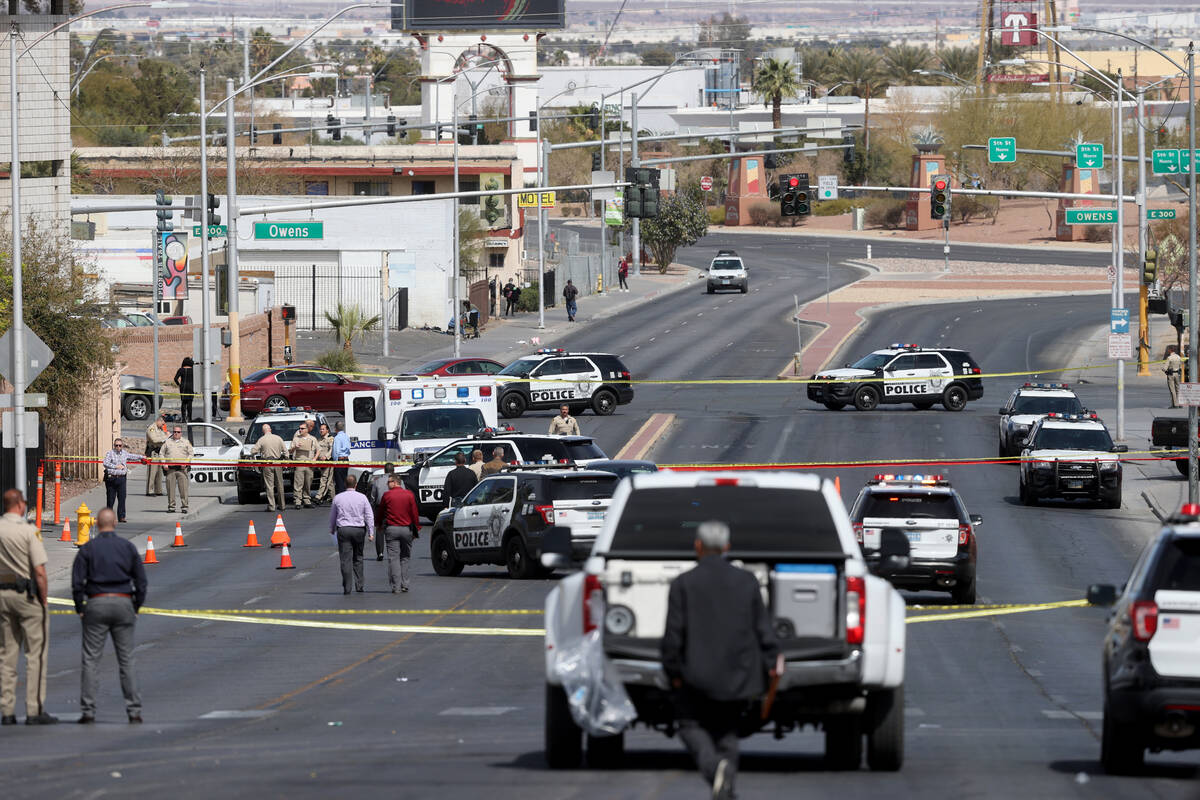 Las Vegas police investigate an officer-involved shooting on North Main Street between Foremast ...