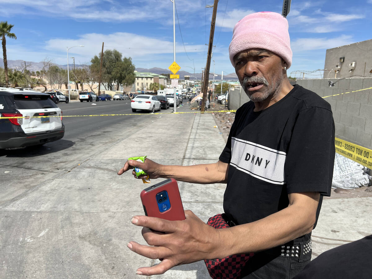 Witness J.D. Williams, 73, talks to a reporter as Las Vegas police investigate an officer-invol ...