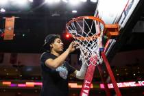 Las Vegas native and Gonzaga Bulldogs guard Julian Strawther cuts down the net after beating St ...