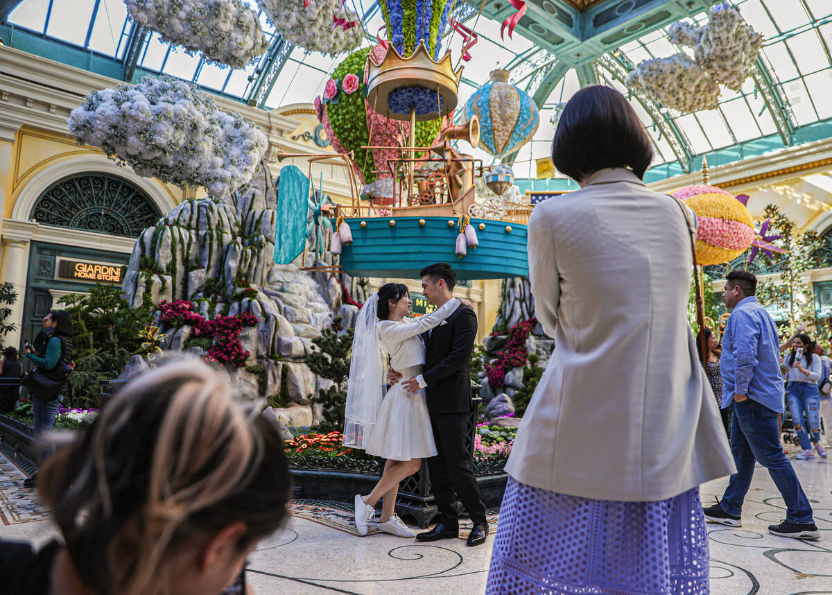 Visitors enjoy the new spring display “Flights of Fancy” at the Bellagio Conserva ...