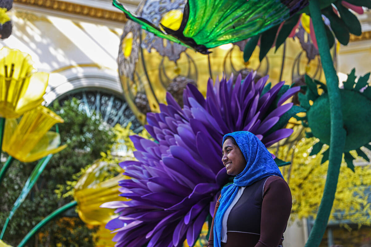 Visitors enjoy the new spring display “Flights of Fancy” at the Bellagio Conserva ...