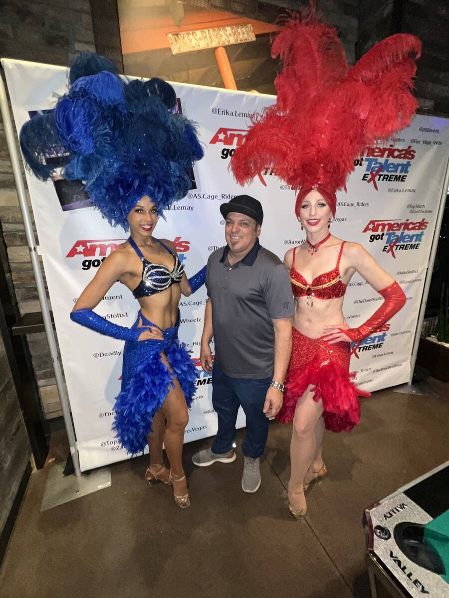 John Stotts is shown with showgirls Ashton Bray (left) and Rebecca O'Hara at the "America's Got ...