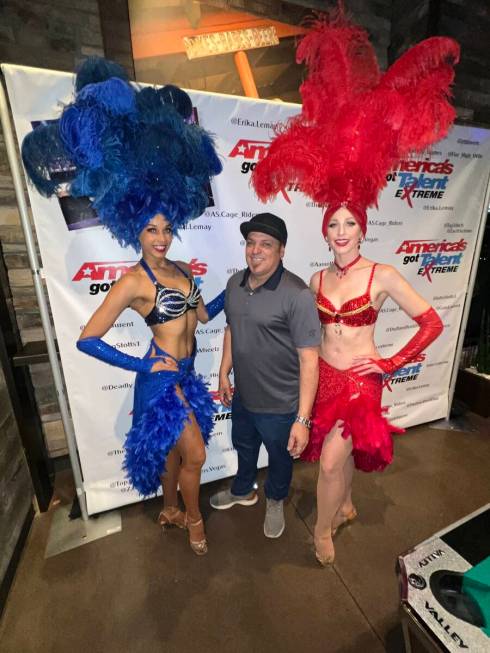 John Stotts is shown with showgirls Ashton Bray (left) and Rebecca O'Hara at the "America's Got ...