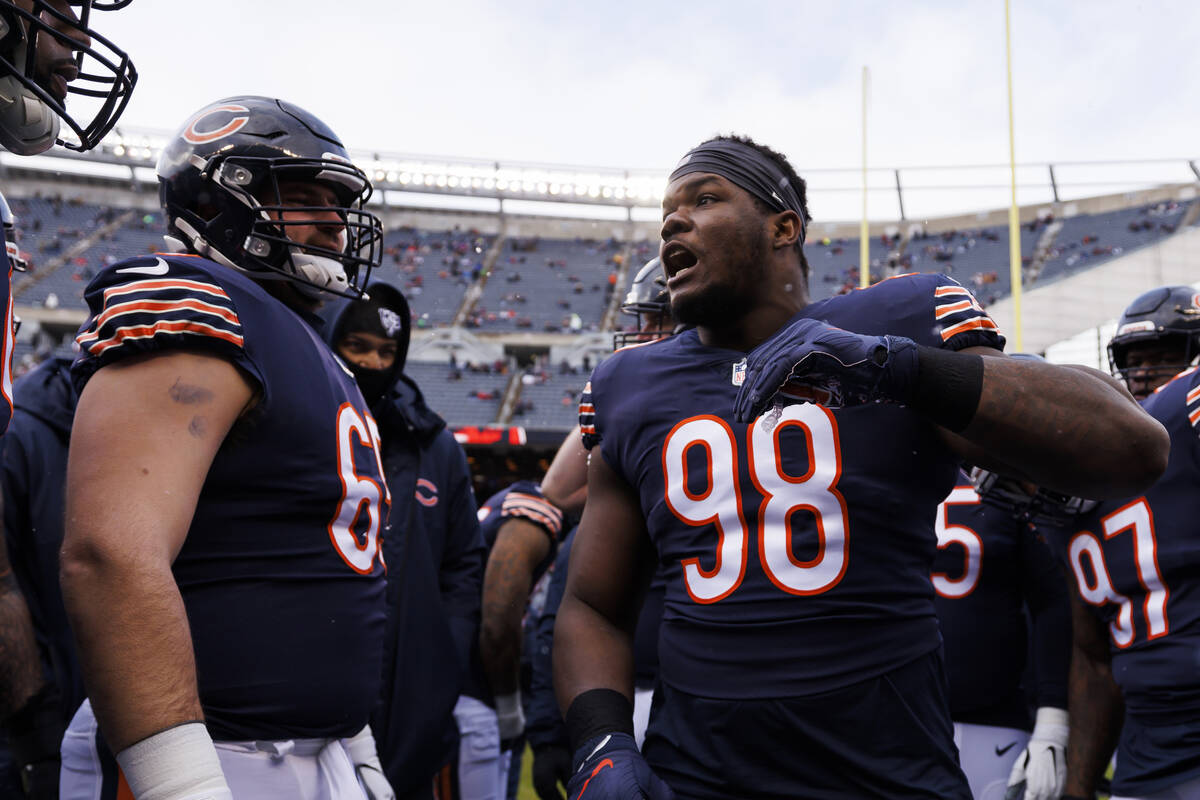Chicago Bears defensive tackle Bilal Nichols (98) is seen in the team huddle during pregame war ...