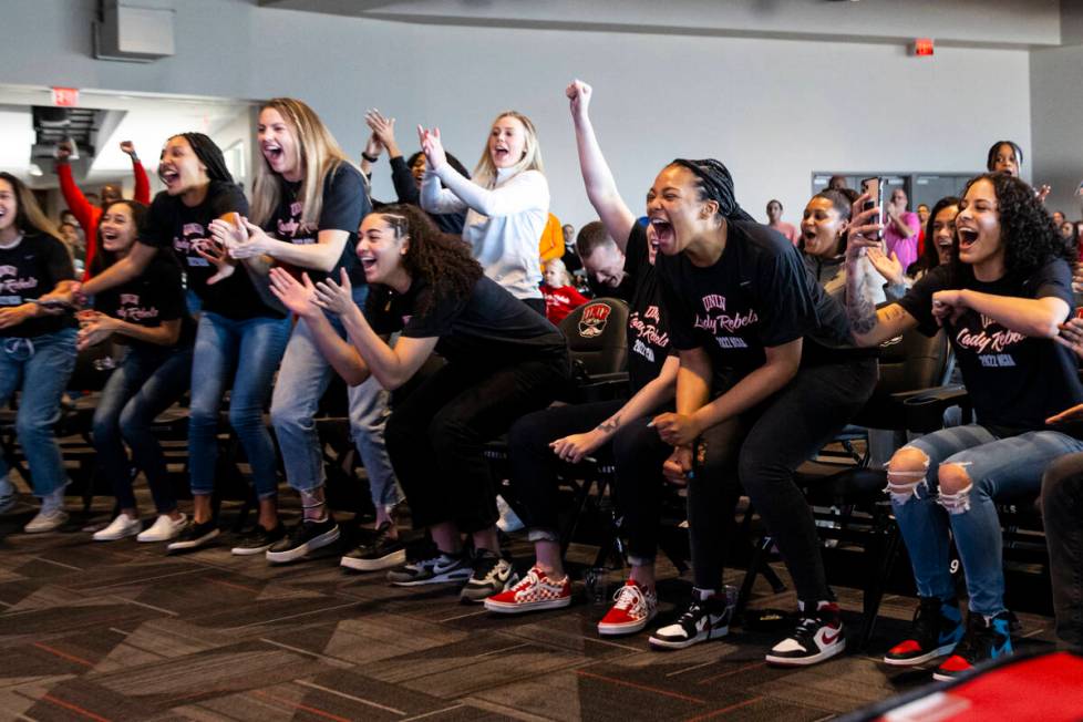 The UNLV Lady Rebels react while watching the NCAA selection show at the Thomas & Mack Center, ...