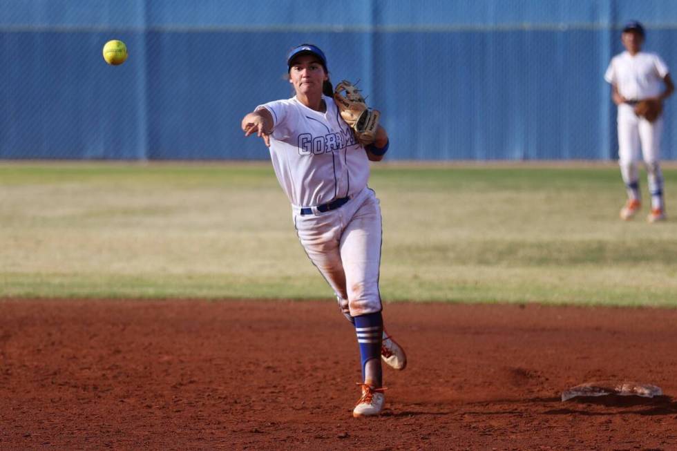 Bishop Gorman’s Brooke Ventrelle (23) throws to first base for an out against Legacy during a ...