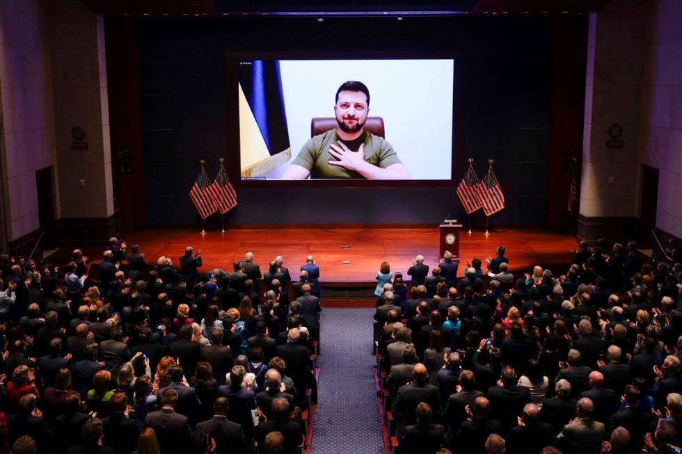Ukrainian President Volodymyr Zelenskyy speaks to the U.S. Congress by video to plead for suppo ...