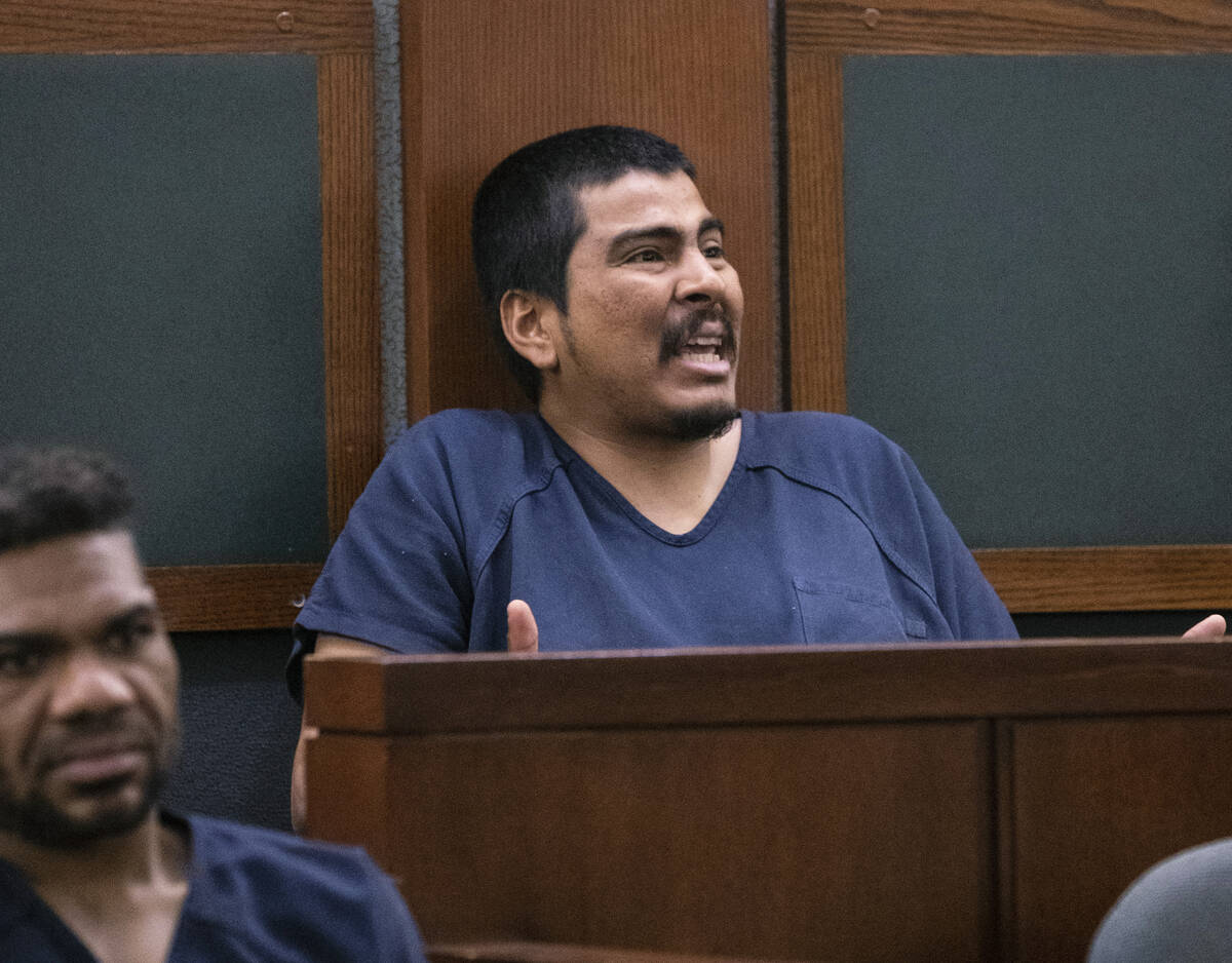 Hector Oswaldo Orellana reacts as his charges are read by a prosecutor at the Regional Justice ...
