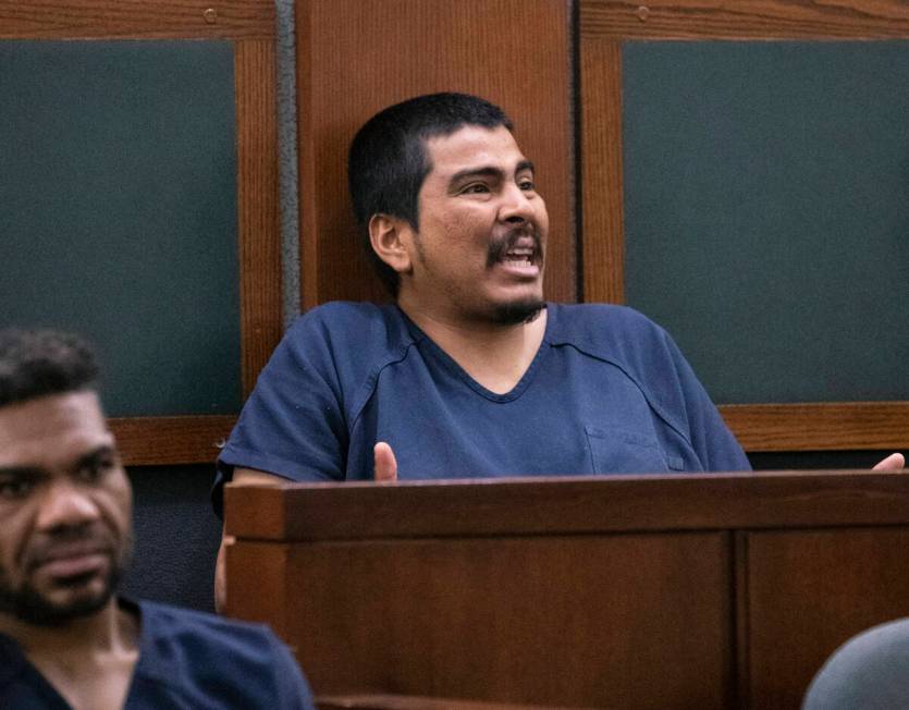 Hector Oswaldo Orellana reacts as his charges are read by a prosecutor at the Regional Justice ...