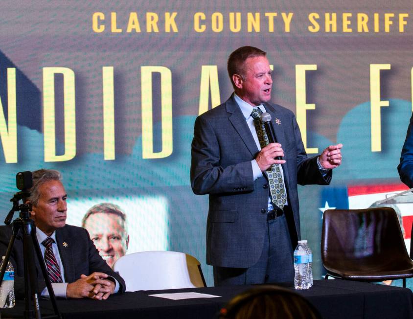 Former Undersheriff and the Clark County Sheriff candidate Kevin McMahill, center, speaks as ca ...