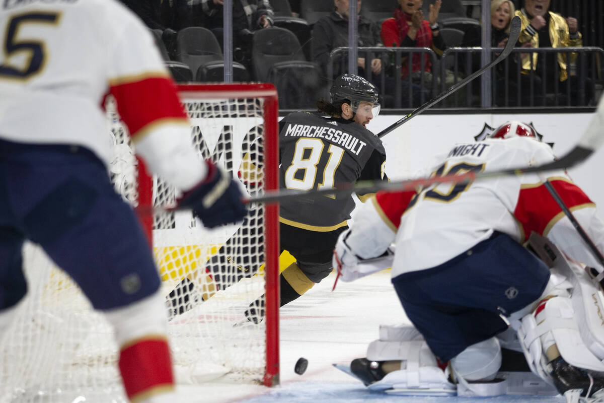 Golden Knights center Jonathan Marchessault (81) looks behind to see Panthers goaltender Spence ...