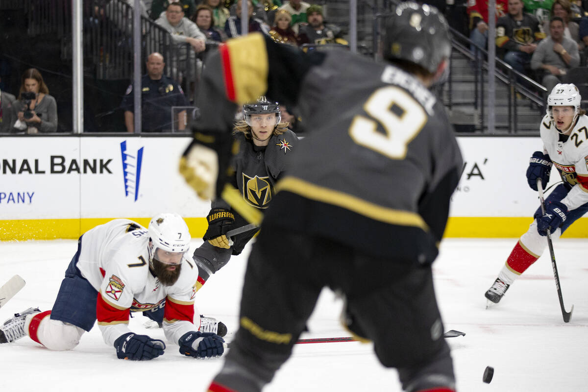 Golden Knights center William Karlsson (71) passes to center Jack Eichel (9) while Panthers def ...