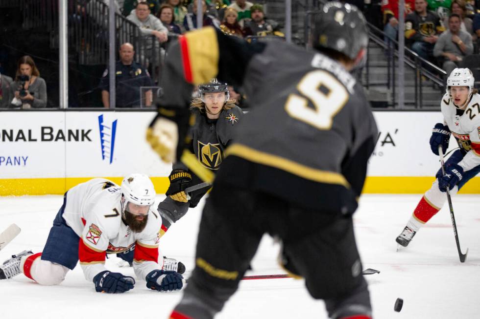 Golden Knights center William Karlsson (71) passes to center Jack Eichel (9) while Panthers def ...