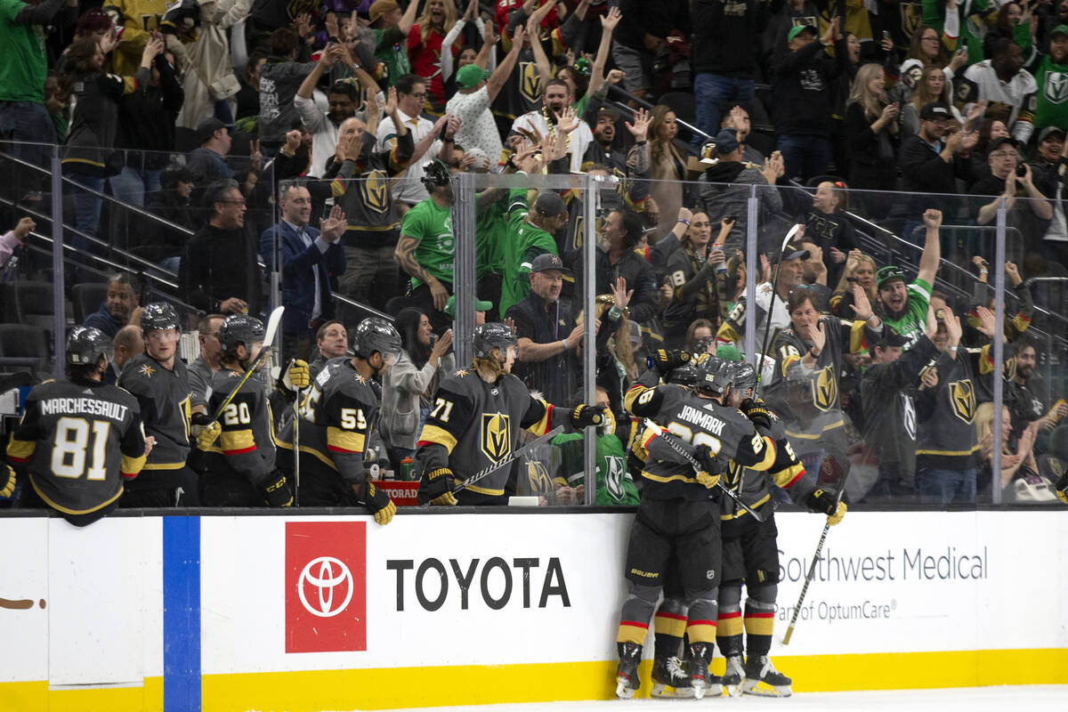 The Golden Knights celebrate after right wing Evgenii Dadonov (63) scored a goal against the Pa ...