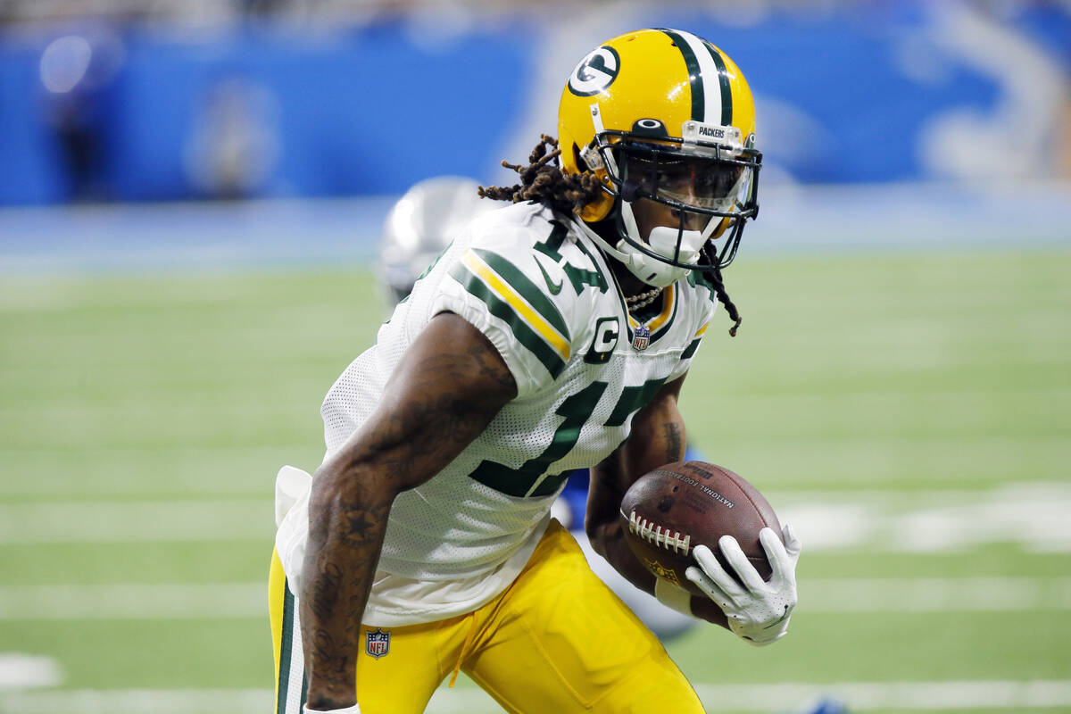 FILE - Green Bay Packers wide receiver Davante Adams runs during the first half of an NFL footb ...