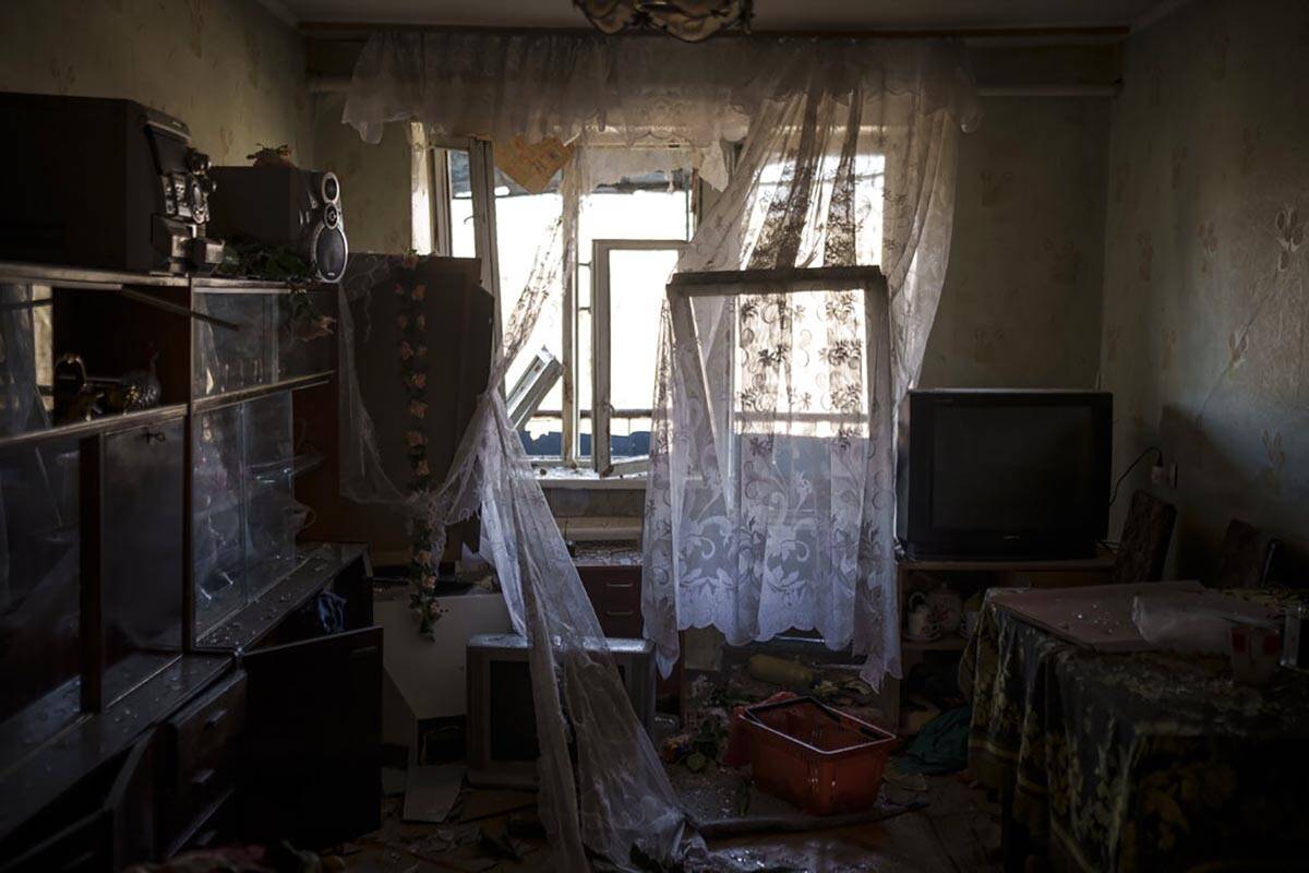 A heavily damaged apartment is seen after a bombing in Kyiv, Ukraine, Friday, March 18, 2022. ( ...