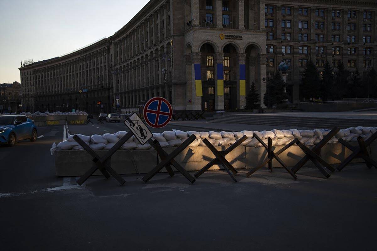 Anti-tank barriers are set up at a check point in Maidan Square, in Kyiv, Ukraine, Friday, Marc ...