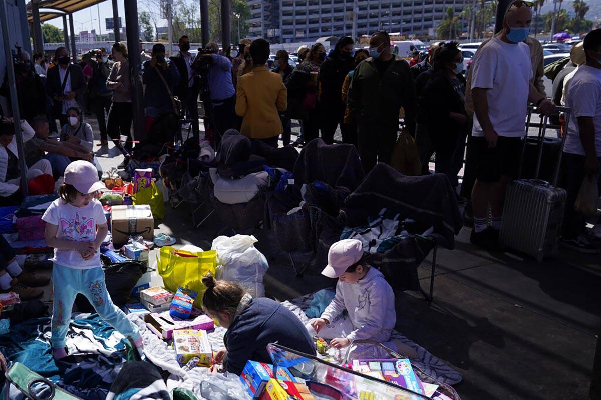 Families mostly from Russia camp out near the San Ysidro Port of Entry into the United States, ...