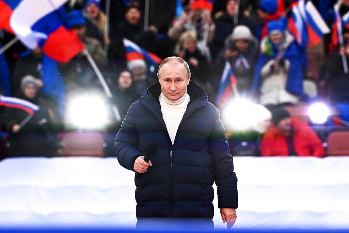 Russian President Vladimir Putin delivers his speech at a concert marking the eighth anniversar ...