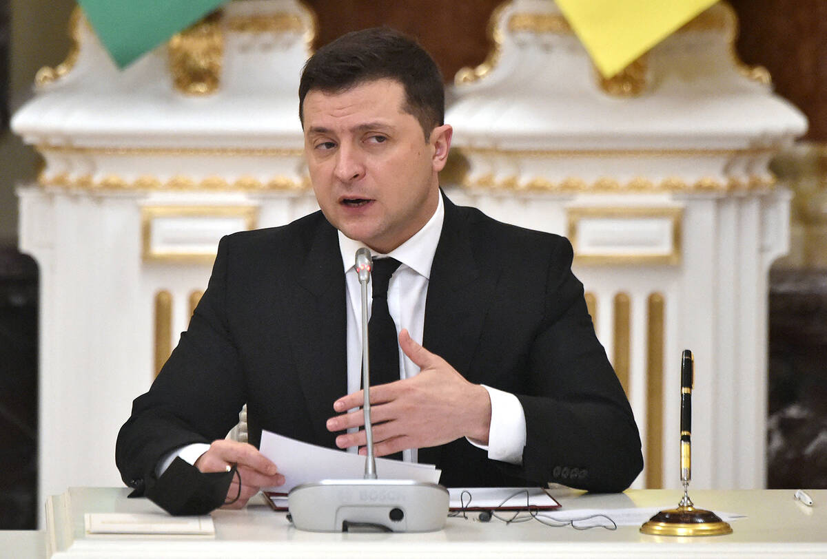 Ukrainian President Volodymyr Zelenskyy gestures during his statement following talks with his ...