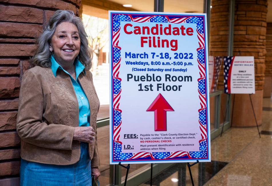 Rep. Dina Titus, D-Nev., with a poster as she prepares to file for re-election at the Clark Cou ...