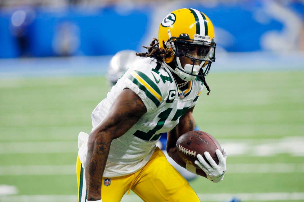 FILE - Green Bay Packers wide receiver Davante Adams runs during the first half of an NFL footb ...