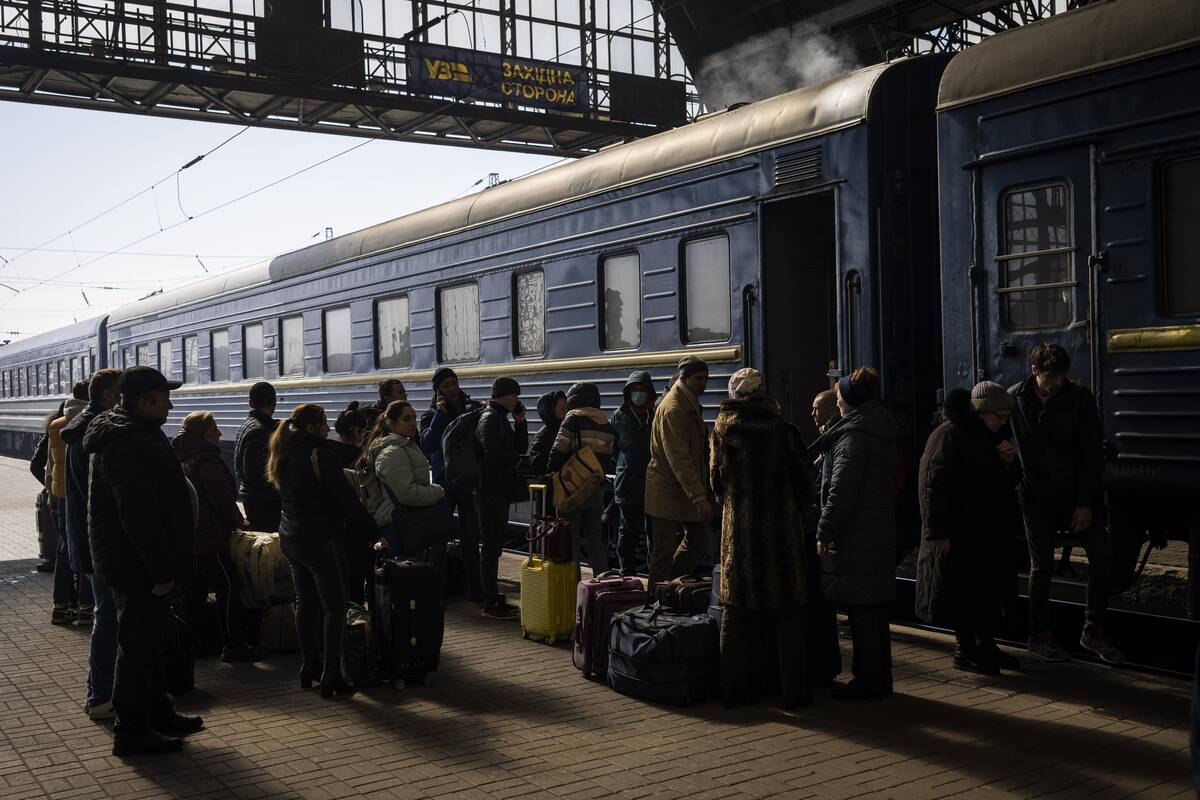 Ukrainians escaping from the besieged city of Mariupol along with other passengers from Zaporiz ...