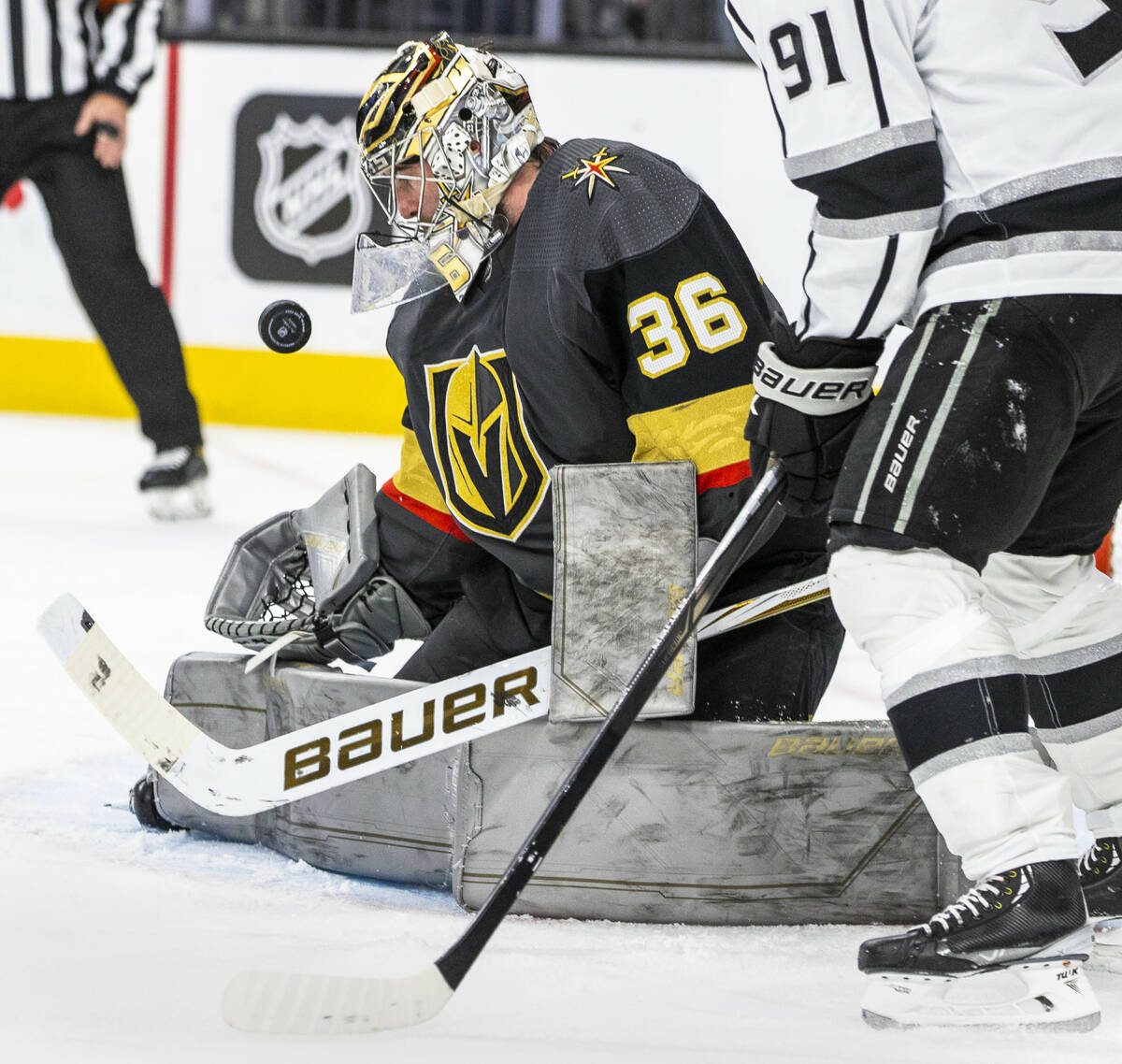Golden Knights goaltender Logan Thompson (36) looks to grab a puck shot with the Los Angeles Ki ...