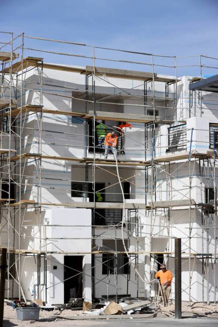 A crew works at the Maverick apartment complex under construction in the southwest Las Vegas Va ...