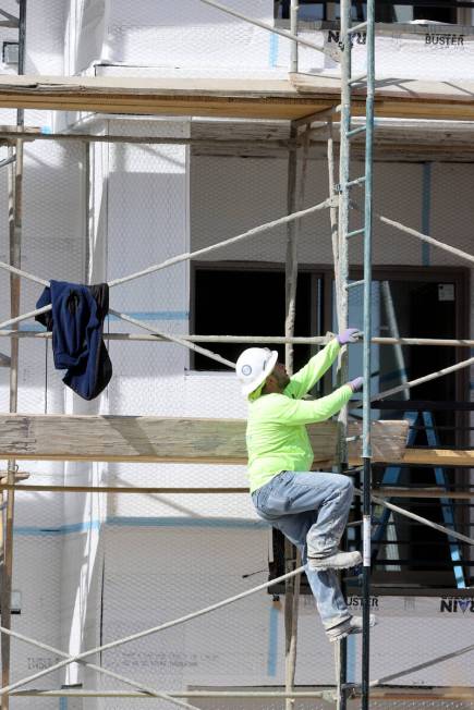 A crew works at the Maverick apartment complex under construction in the southwest Las Vegas Va ...