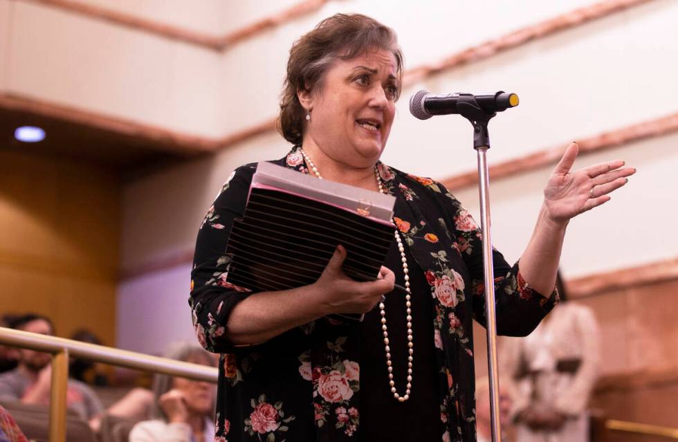 Julie Davies, an educator of a local short-term rental course, speaks during a town hall regard ...