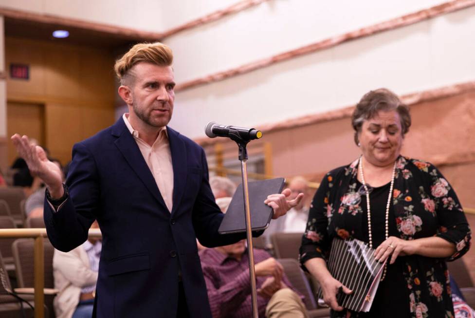 Dwight Calwhite, left, an Airbnb owner/operator, speaks during a town hall regarding the regula ...