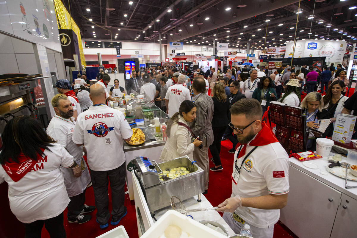 Chefs, including Aurelio Petra, right, of distributor Orlando Food Sales, which carries Italian ...