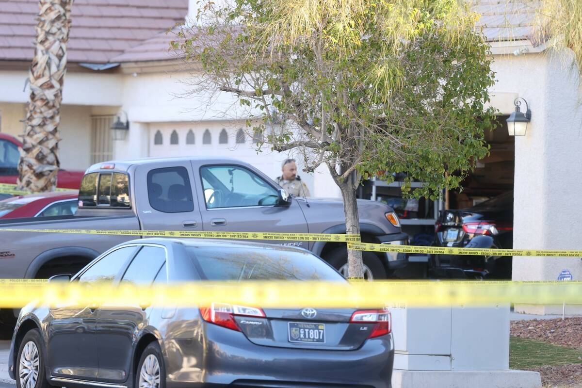 Police investigate the deaths of two people at a home in the 7600 block of Constellation Street ...