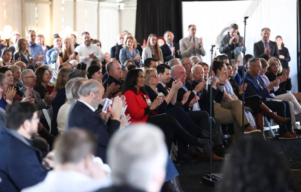 People applaud as officials prepare to break ground on West Henderson Hospital on Wednesday, Ma ...