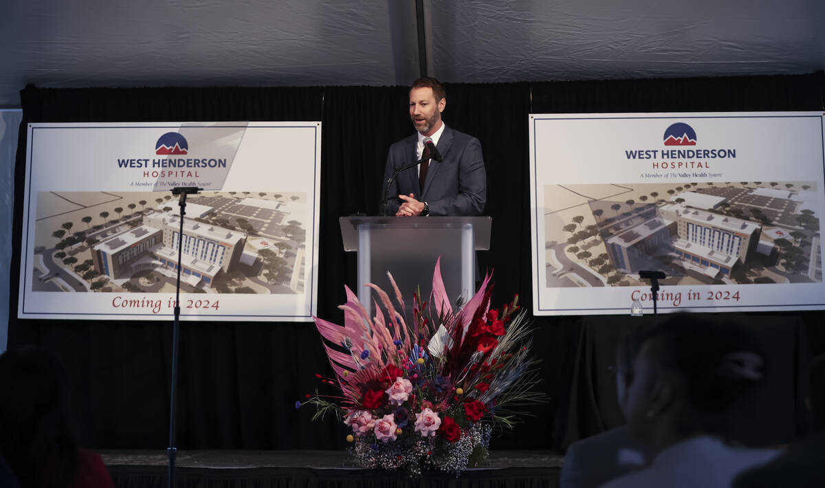 Chris Loftus, CEO of West Henderson and Desert Springs Hospitals, speaks before breaking ground ...