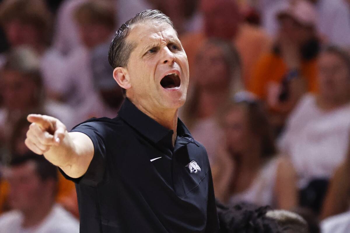 Arkansas head coach Eric Musselman yells to his players during the first half of an NCAA colleg ...