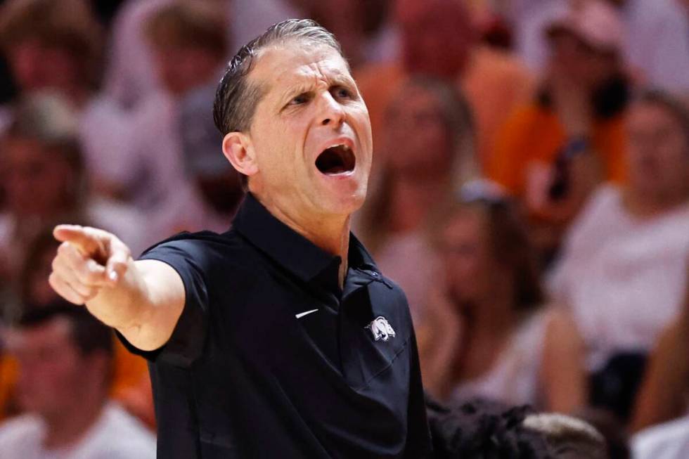 Arkansas head coach Eric Musselman yells to his players during the first half of an NCAA colleg ...
