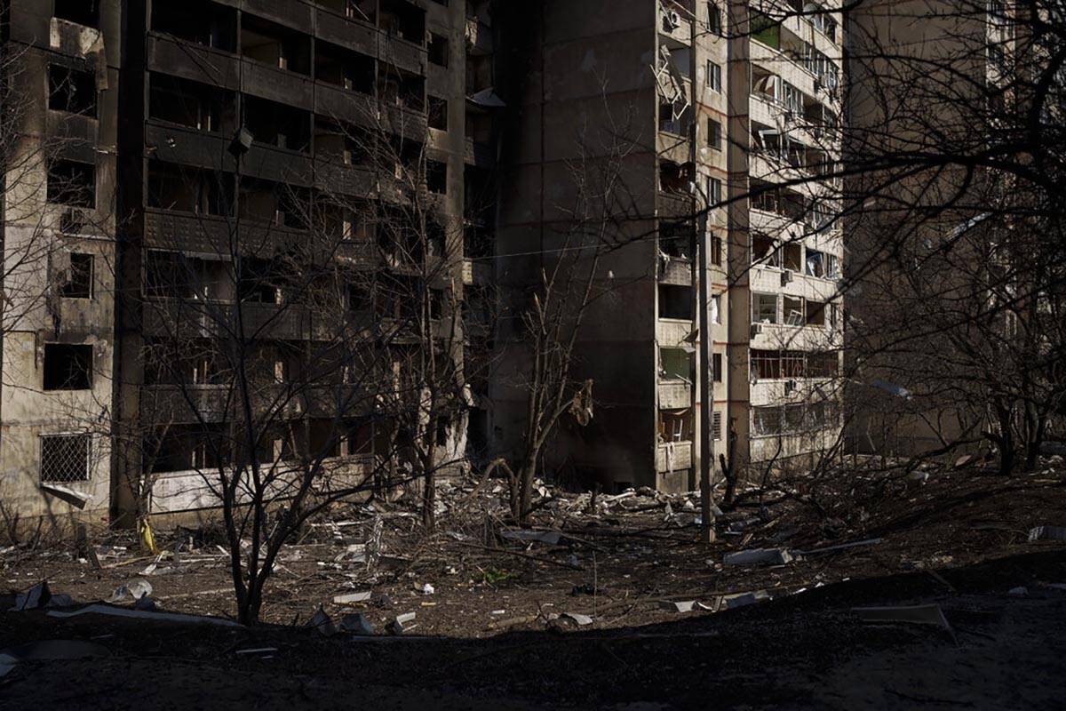 Residential apartment building are seen heavily damaged after a Russian attack in Kharkiv, Ukra ...