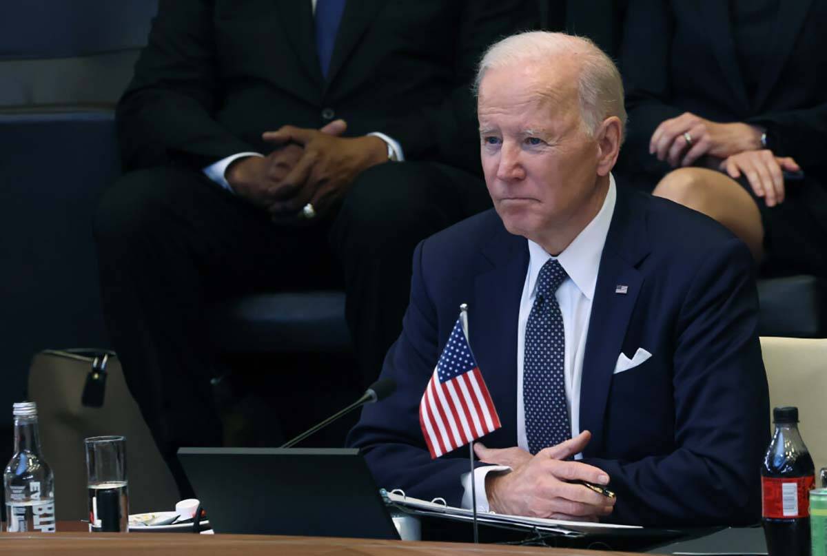 President Joe Biden attends a North Atlantic Council meeting during a NATO summit to discuss Ru ...