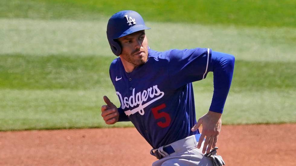 Los Angeles Dodgers' Freddie Freeman runs during the first inning of a spring training baseball ...