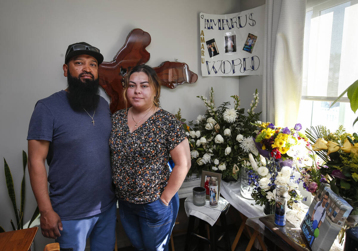 Vanessa and Gerardo Sinay next to items left in memory of their son, Amaru Sinay, who died earl ...