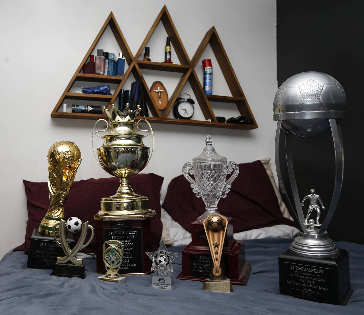 Soccer trophies in the bedroom of Amaru Sinay, who died earlier this month, at the family’s h ...