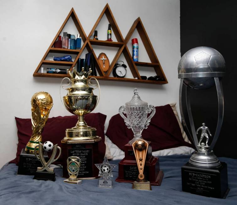 Soccer trophies in the bedroom of Amaru Sinay, who died earlier this month, at the family’s h ...