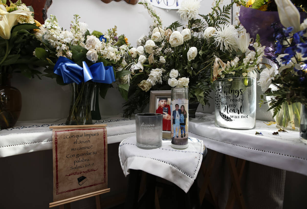 Pictures, flowers and other items in memory of Amaru Sinay, who died earlier this month, are se ...