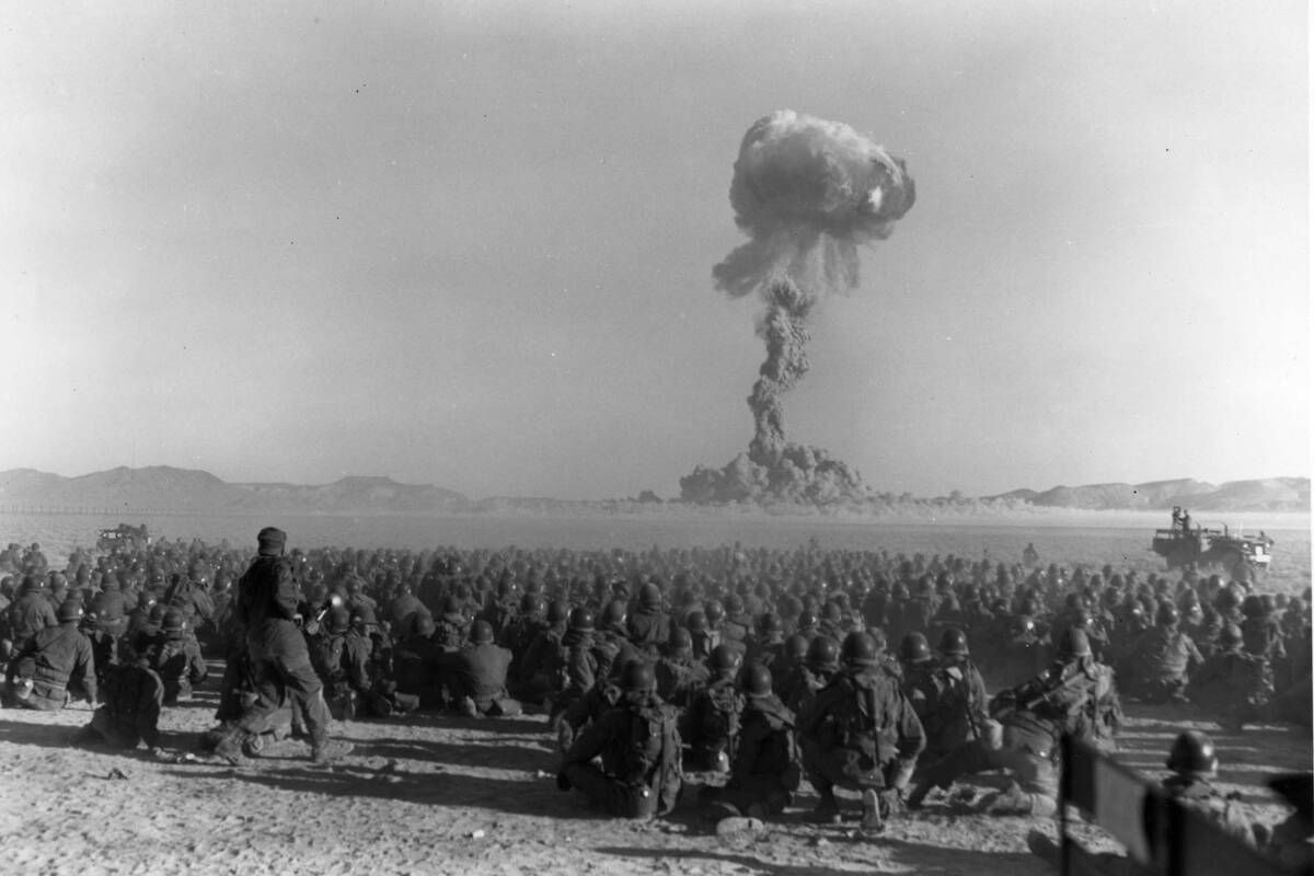 This early photo shows an atomic bomb test at what was then called the Nevada Proving Grounds, ...