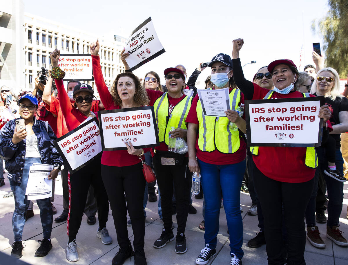 Hundreds of culinary and bartenders union members rally outside of the Foley Federal Building i ...