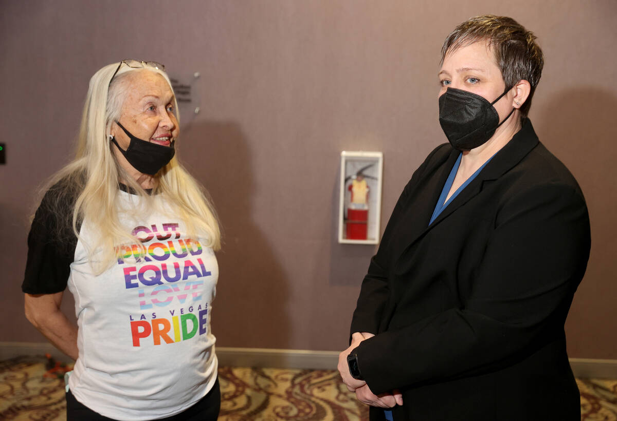 Clark County District Judge Tara Clark Newberry, right, visits with Judy Bowen Wiener during th ...