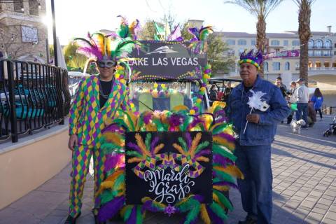Lake Las Vegas celebrated Mardi Gras with a golf cart parade and colorful outfits decked out wi ...