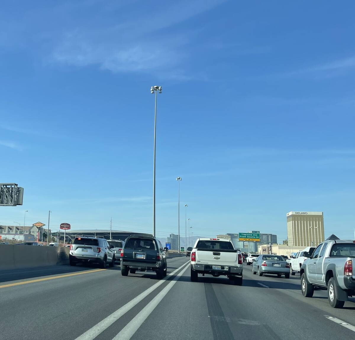 A Nevada State Police Trooper pulls over a motorist in a Interstate 15 HOV lane in Las Vegas on ...